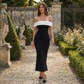 Vestido largo maxi de hombros descubiertos en estilo Old Money de la marca SLIPPO®, con contraste en diseño elegante y sofisticado.