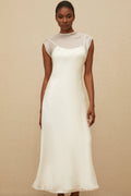 Vestido largo blanco de tul con corte acampanado de la marca Final Sale, ideal para ocasiones elegantes y especiales.