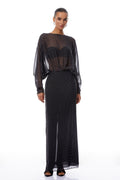 Vestido largo de gasa negro con lunares blancos de la marca Final Sale, estilo maxi, con diseño elegante y fluido.