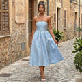 Vestido midi sin tirantes SLIPPO® Cressida en jacquard, diseño elegante y ajustado, con patrón texturizado y corte sofisticado.