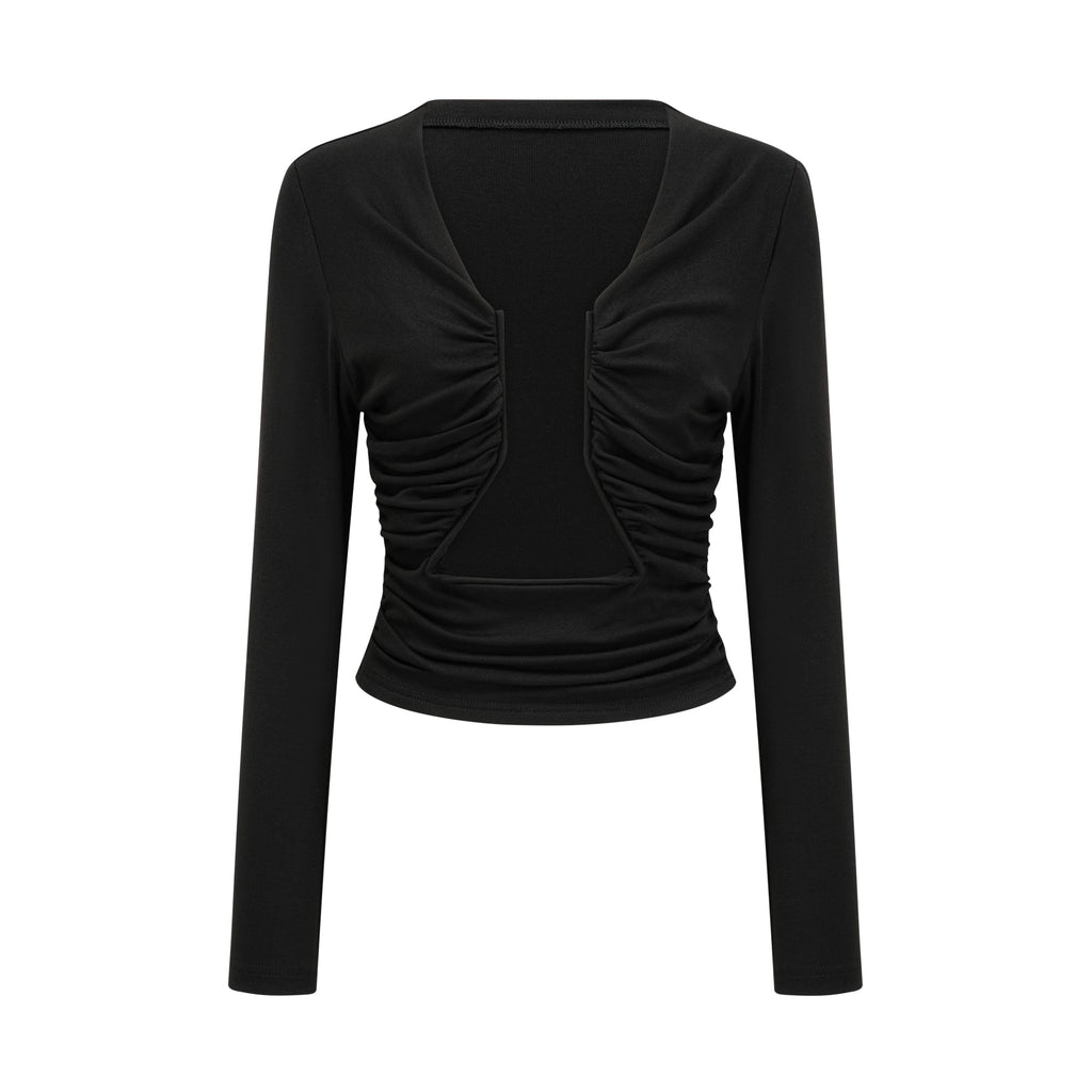 Blusa negra Anaïs con abertura frontal y detalles fruncidos, estilo elegante y moderno, vista de la parte superior sobre fondo neutro.