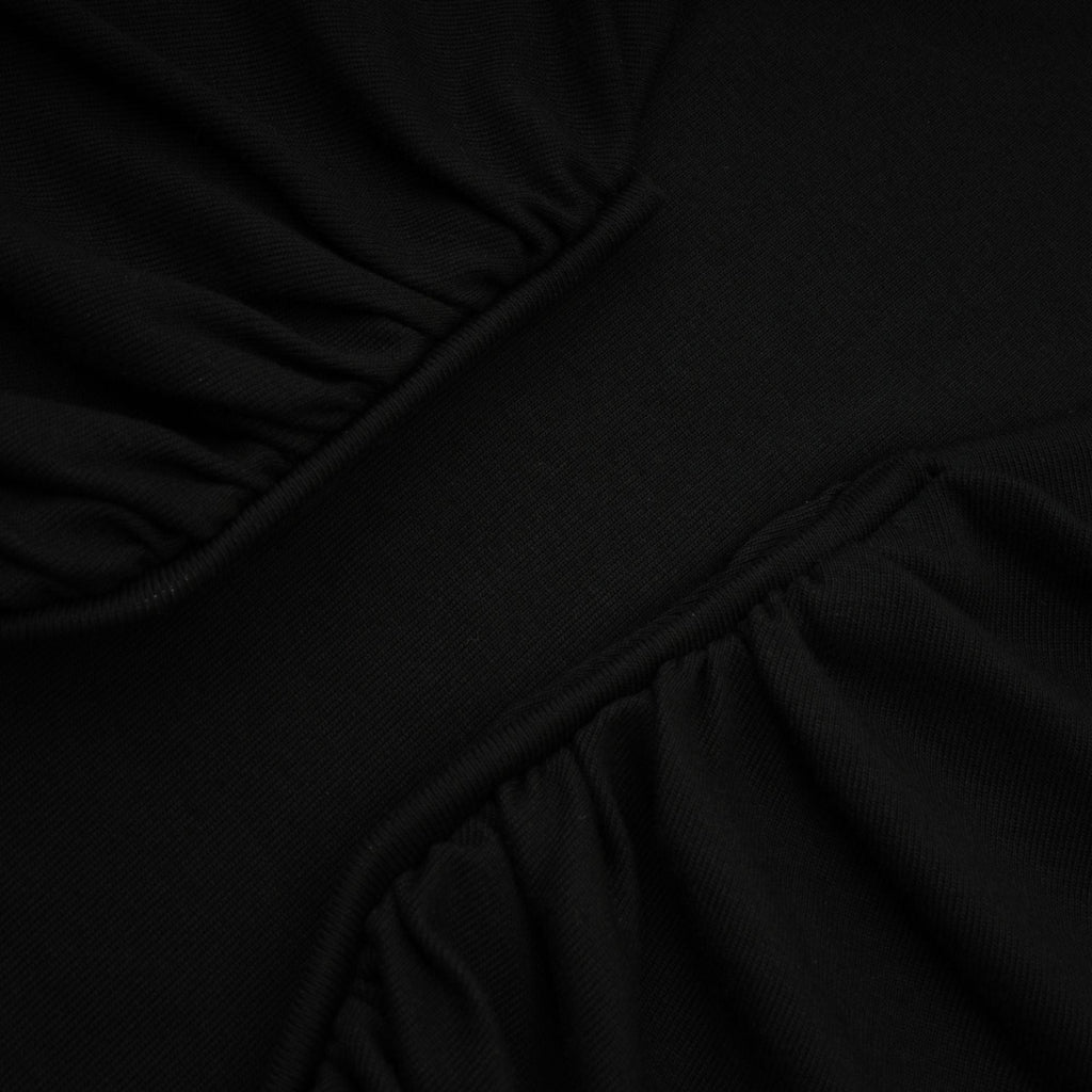 Blusa negra abierta en el frente con fruncido de la marca Final Sale, vista en la imagen DSC00208.