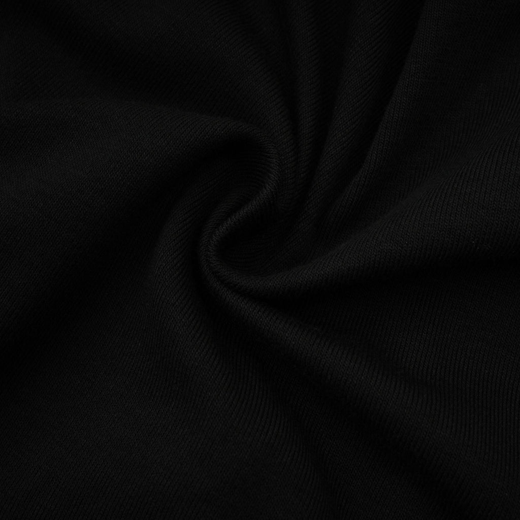 Blusa negra Anaïs de apertura frontal con fruncido, estilo informal, mostrada en la imagen en un fondo neutro.