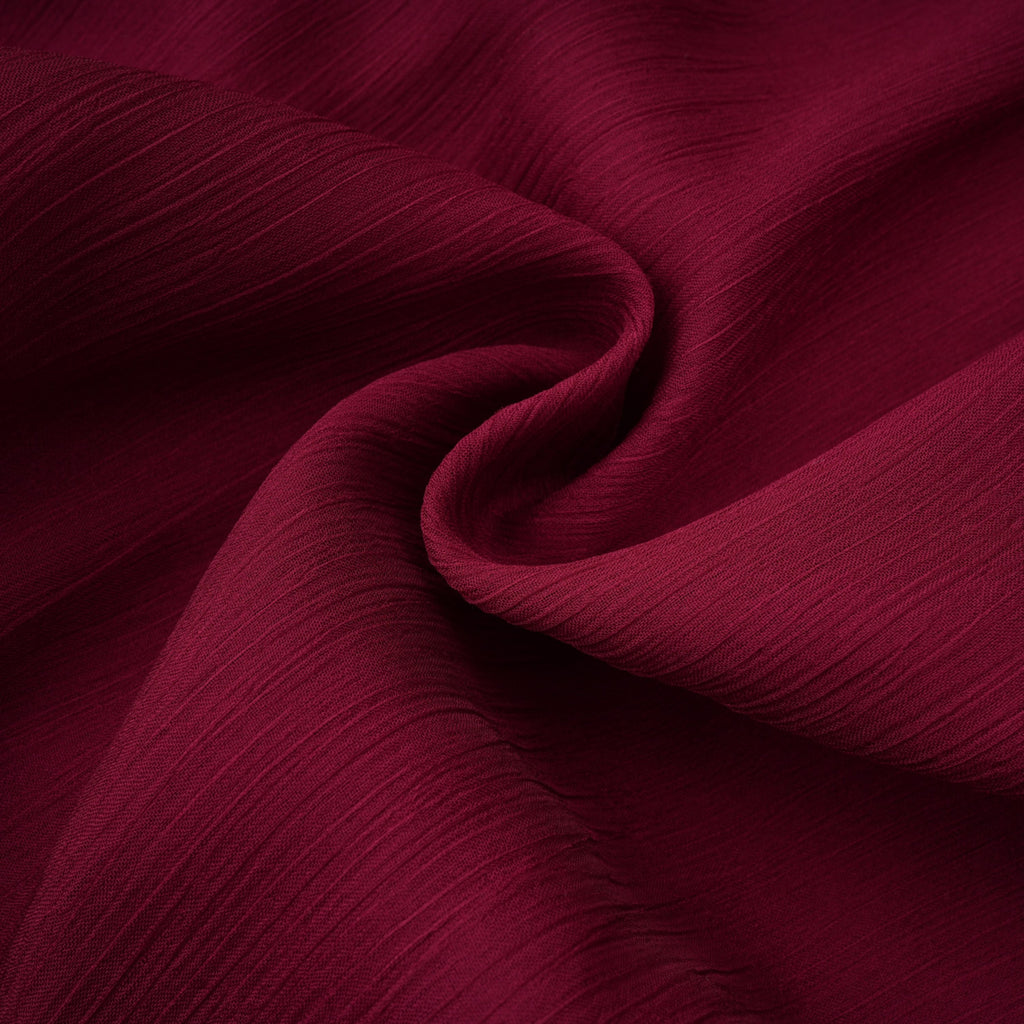 Vestido mini asimétrico de tul burgundy Éléna de Final Sale, con volantes y diseño elegante para ocasiones especiales.