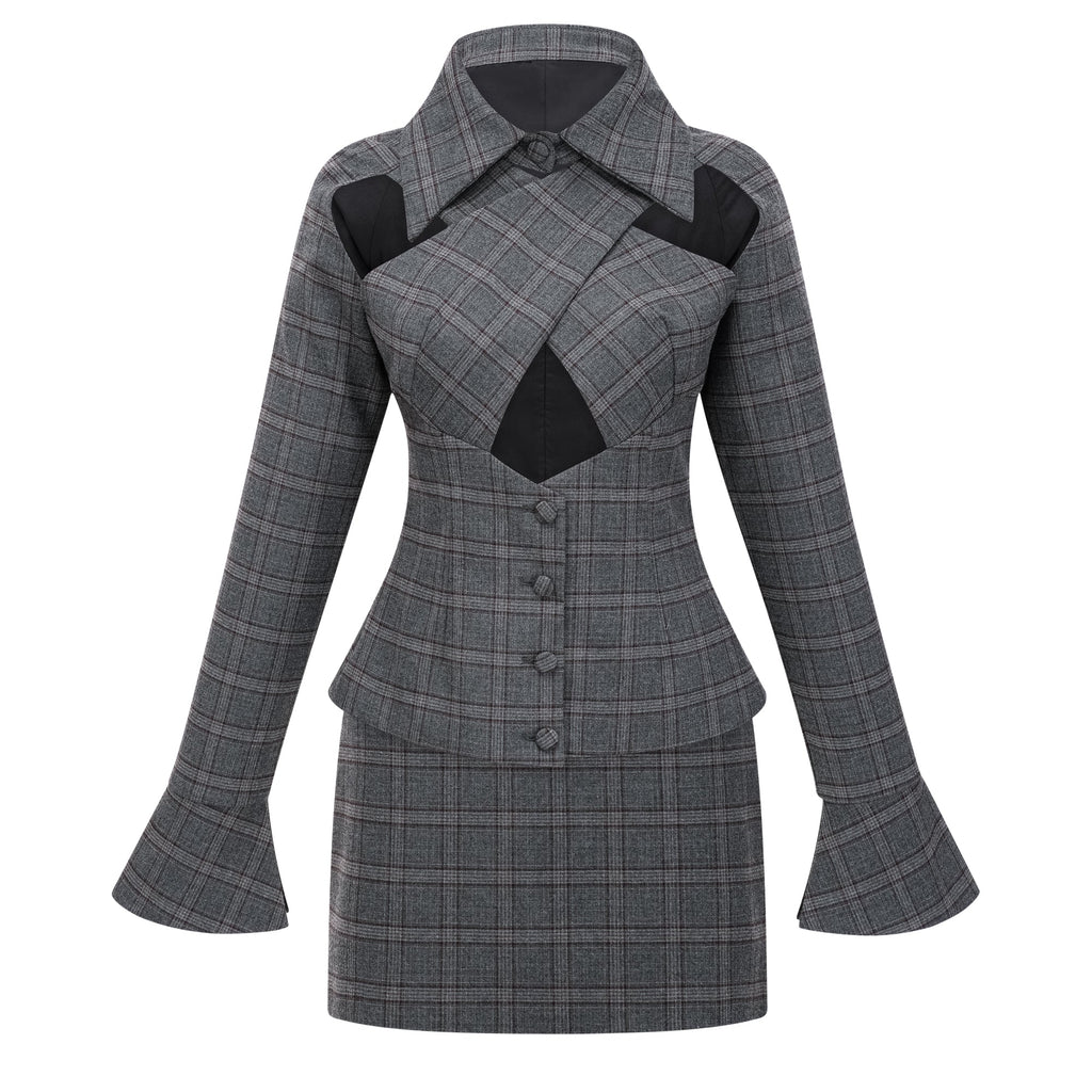 Conjunto de blazer y falda a cuadros en gris de la marca Bridal, con detalles de corte en el blazer.