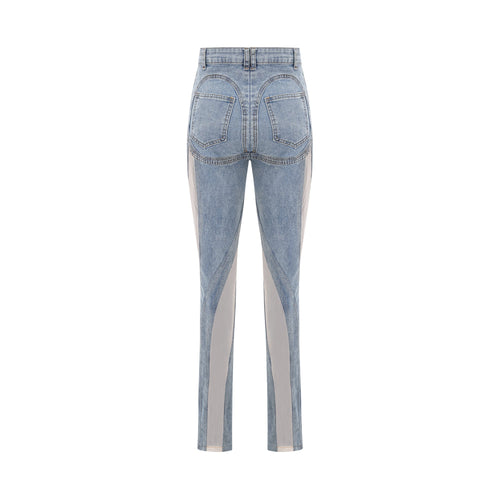 Jeans de paneles transparentes Aélis de marca Final Sale, estilo ajustado y moderno, con detalles de costuras visibles.