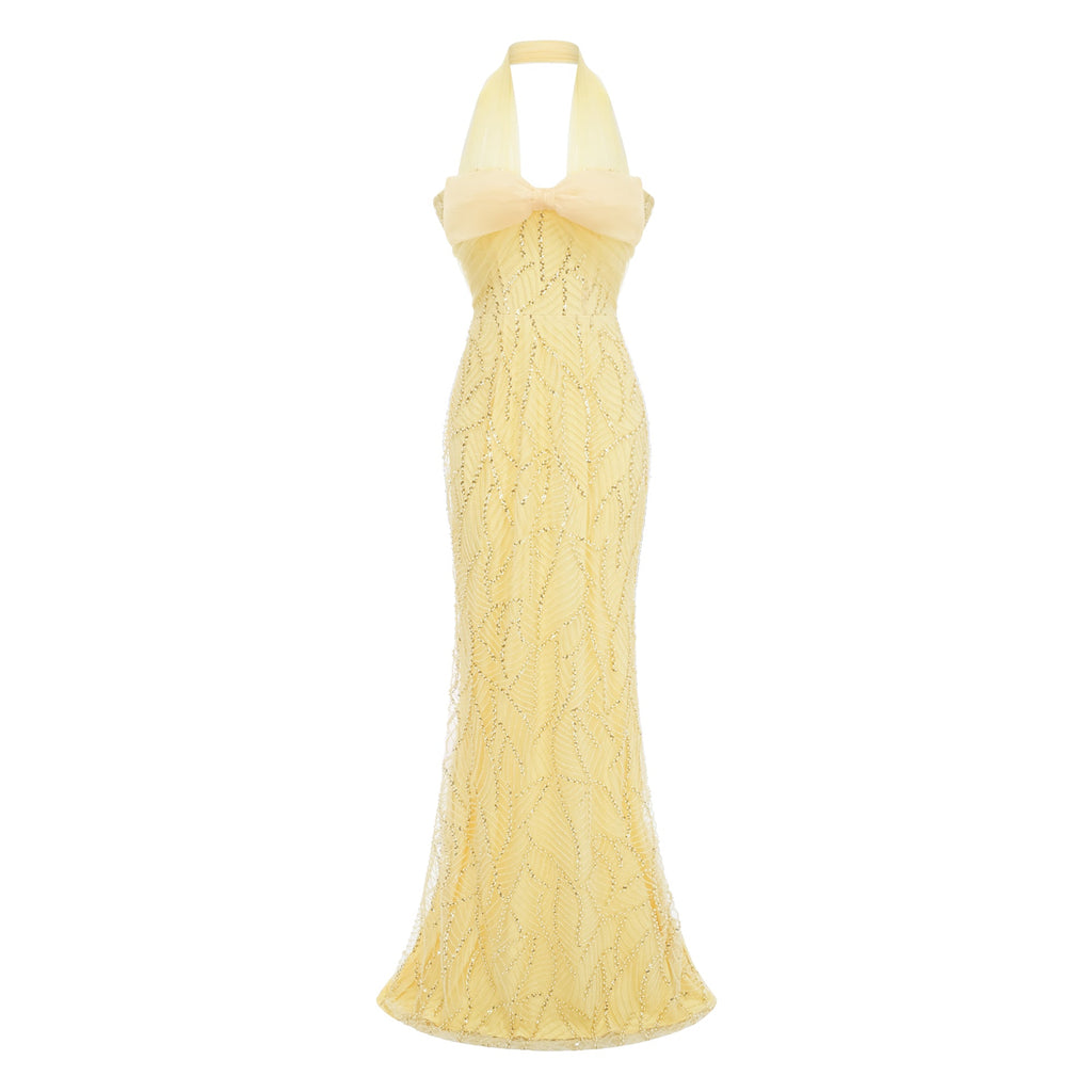 Vestido largo maxi de novia Antonia amarillo con lazo halter y escote alto, diseñado por Bridal.
