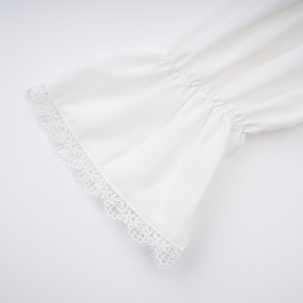 Paulette white bowknot shirred-panel ruffled shirt