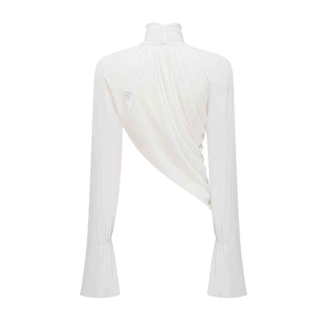 Conjunto de top y falda de cuello alto y recortes en color blanco de la marca Bridal, mostrado en la imagen.