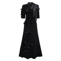 Vestido largo negro con lazo y aplicaciones florales de la marca Bridal, con detalles elegantes y diseño maxi.