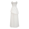 Conjunto de vestido y falda blancos de novia Melisande con adornos delicados y detalles elegantes, en color blanco.
