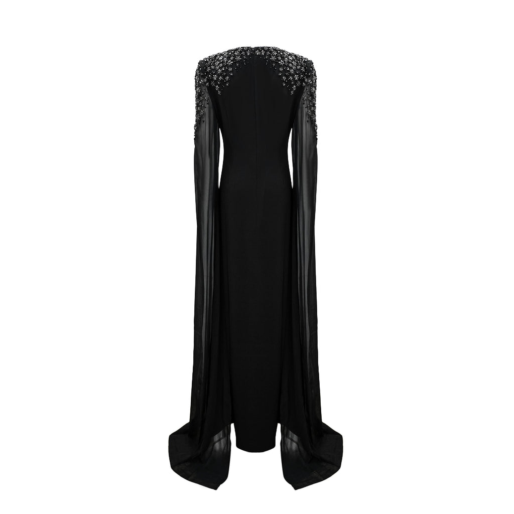 Vestido largo negro Yseult con adornos brillantes y detalles elegantes, diseñado para ocasiones formales.