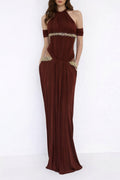 Vestido largo maxi rojo con escote halter y adornos de cristales de la marca MRNewyork, vista frontal en color vibrante.
