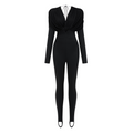 Mono negro Gianina de Bridal con escote en V profundo y diseño drapeado, elegante y moderno para ocasiones especiales.