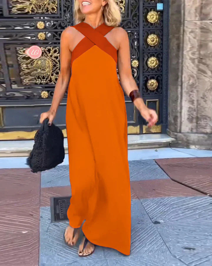 Vestido cruzado María de Morrison Manchester, en tela ligera con diseño elegante y cintura ajustada, mostrado en color oscuro.