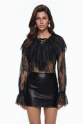Blusa de encaje semi transparente negra Tilly de MRNewyork, con detalles delicados y diseño elegante.