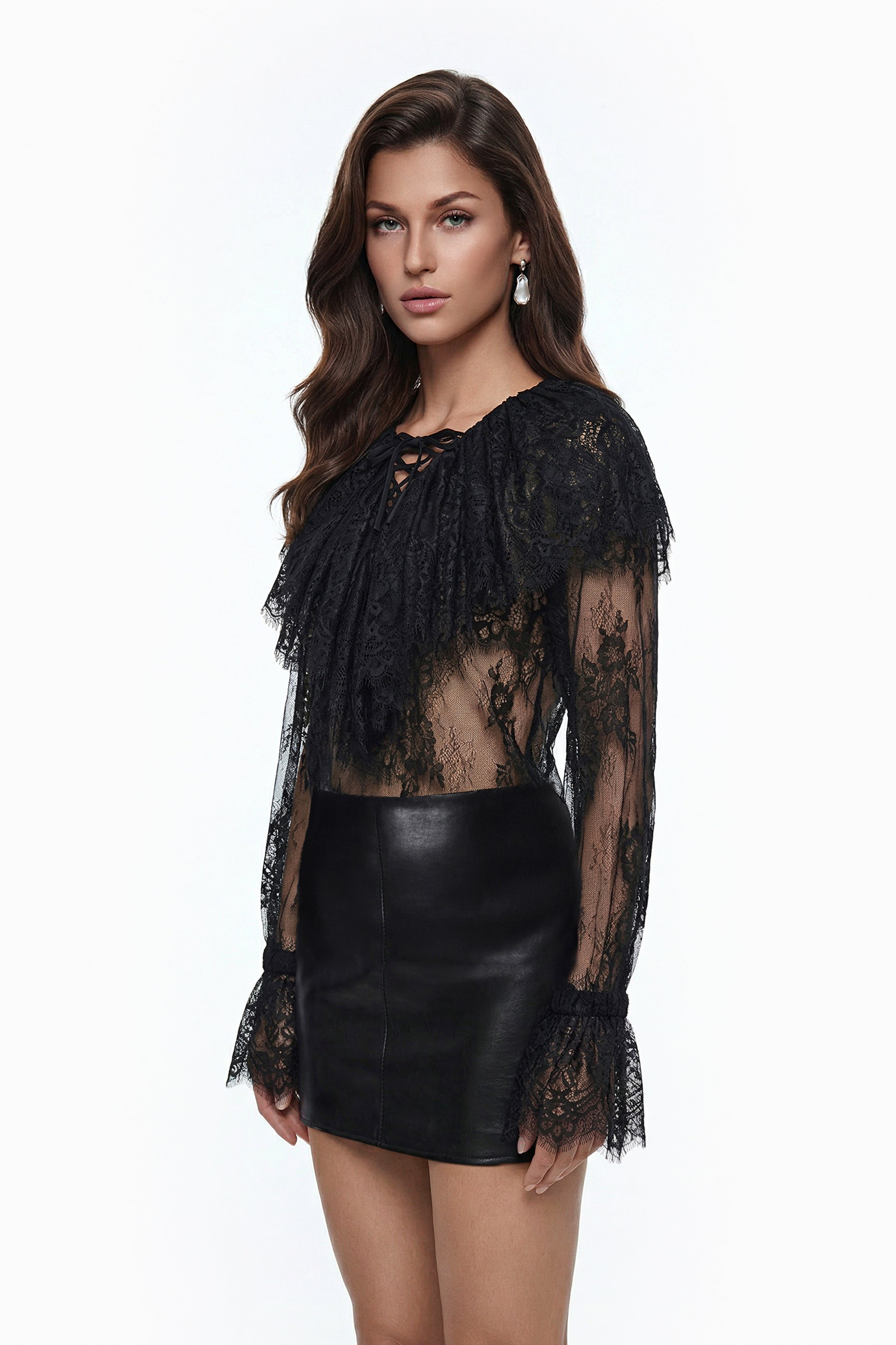 Blusa de encaje semi-transparente negra Tilly de MRNewyork, con diseño elegante y detalles delicados.