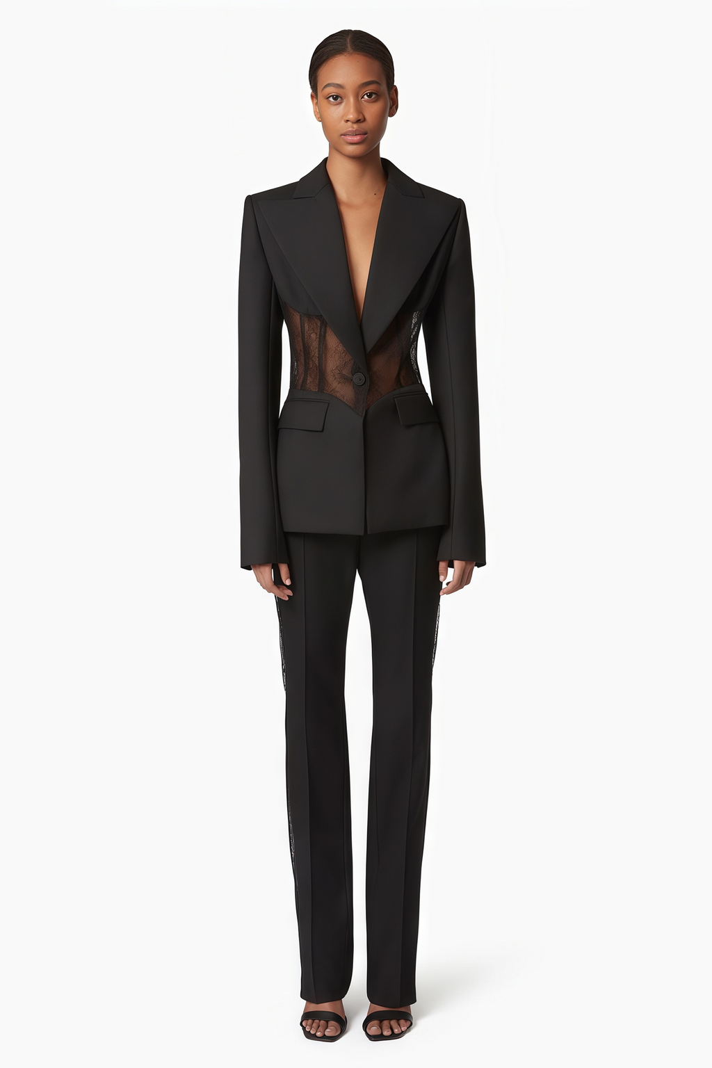Chaqueta blazer negra con panel de encaje floral Verena Bridal, con diseño elegante y detalles delicados en la imagen.