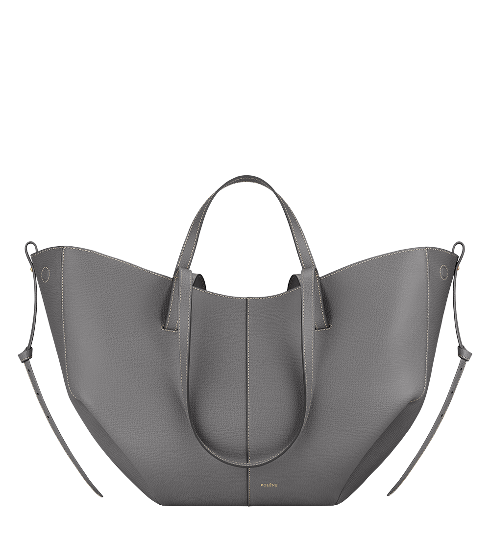 Bolso de mano Polène Cyme con textura de piedra piel granulada, vista frontal del packshot.