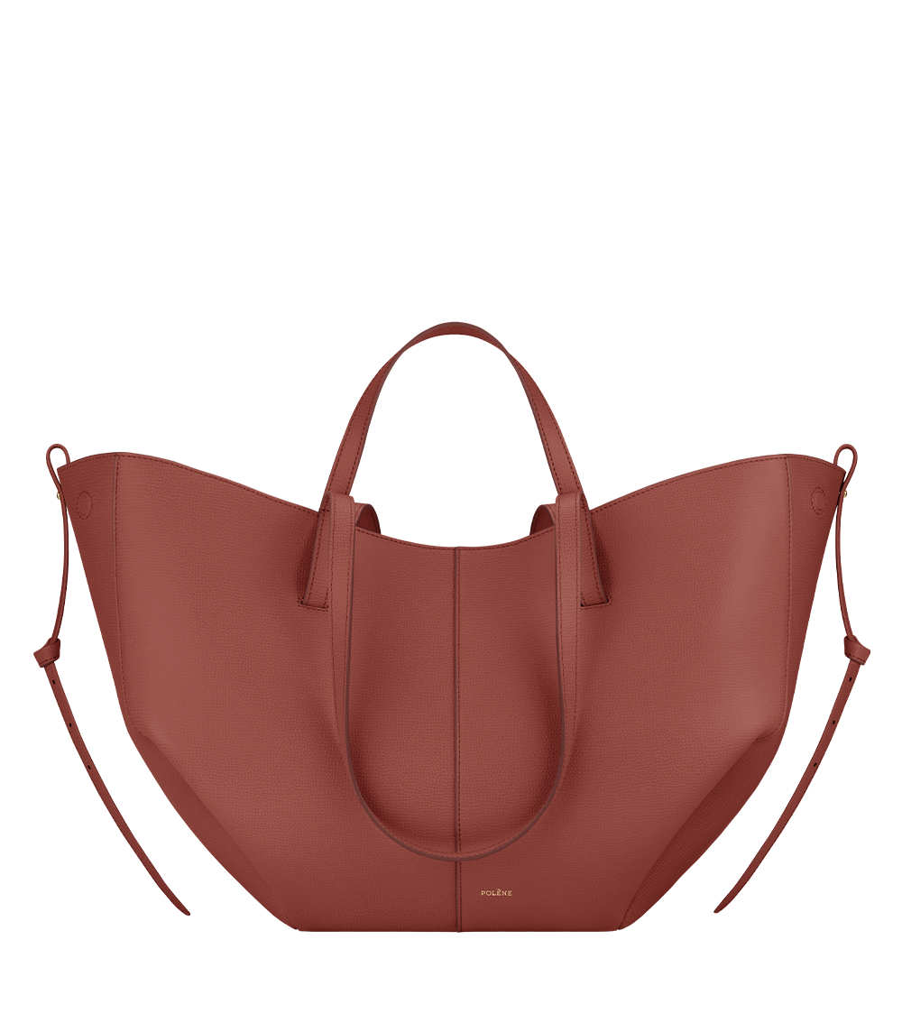 Bolso de mano Polène Cyme en terracota piel granulada, vista frontal del diseño elegante y texturizado.