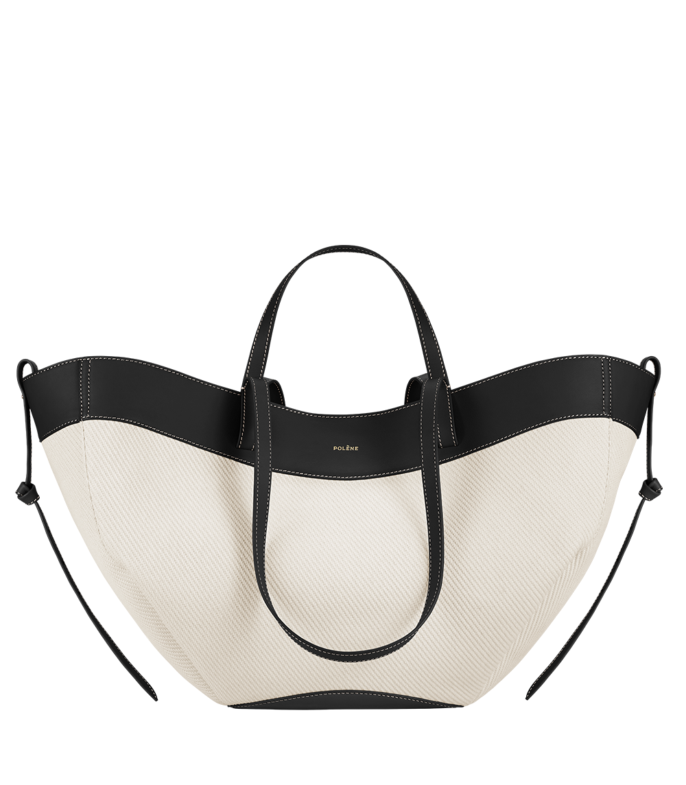 Bolso de mano trenzado negro Polène Cyme, vista frontal del diseño de tela con detalles elegantes.